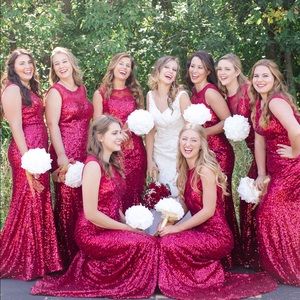 A beautiful, formal red sequined dress.